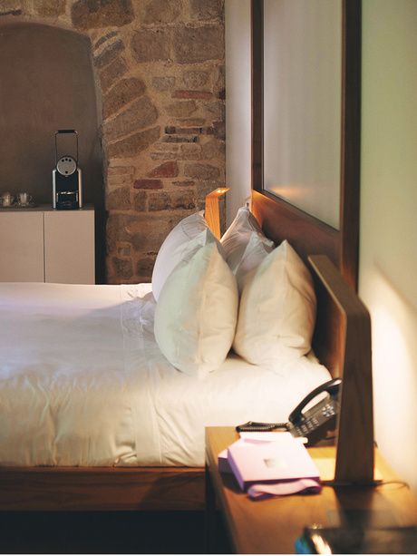 Cama de la habitación Premium Junior Suite en Hotel Mercer Barcelona