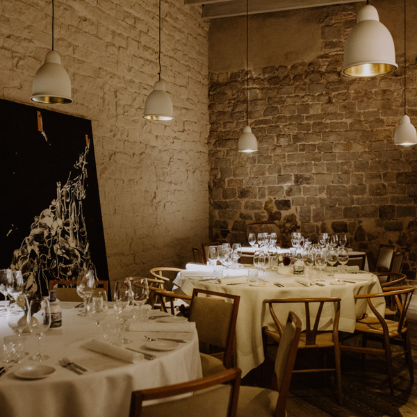 Mercer Hotel Barcelona - Round tables setup at the Mercer Restaurant